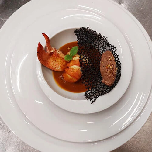 Astice in brodetto con finocchi al pernod e spuma al fondente con peperoncino - Chef Stefano Rota - Ristorante Vascello Fantasma | Laigueglia